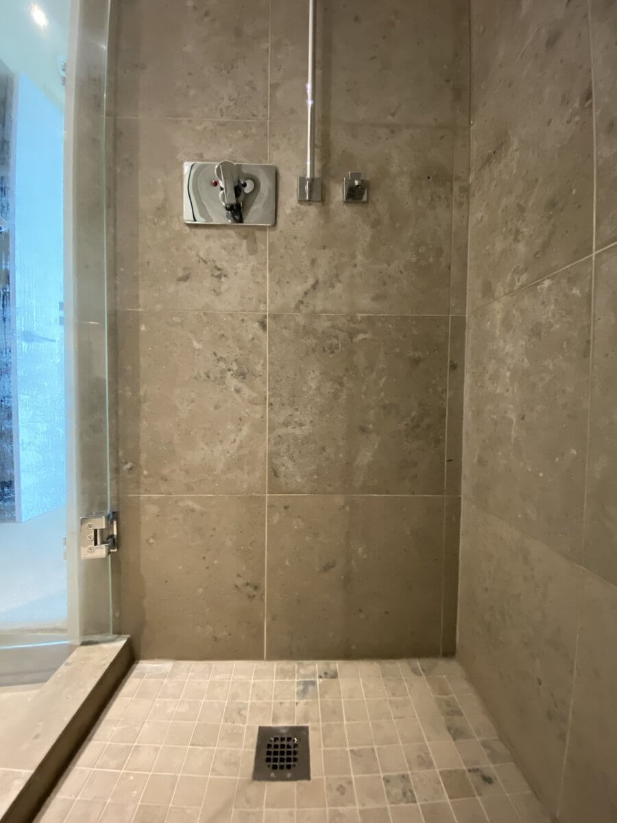 Limestone shower Stall Deep Clean NUVOCLEAN® Surface Restoration