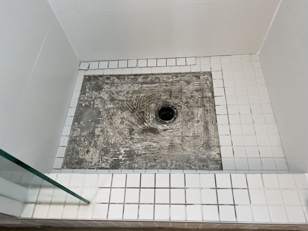 shower stall repair vancouver loose tiles removed